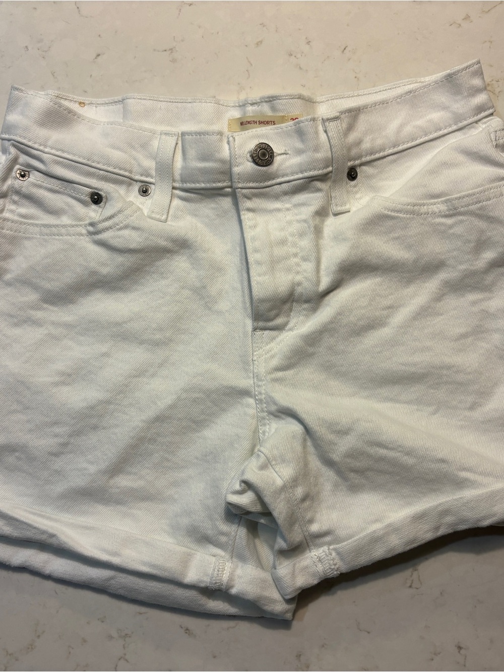 Levi’s White Denim High-Rise Shorts